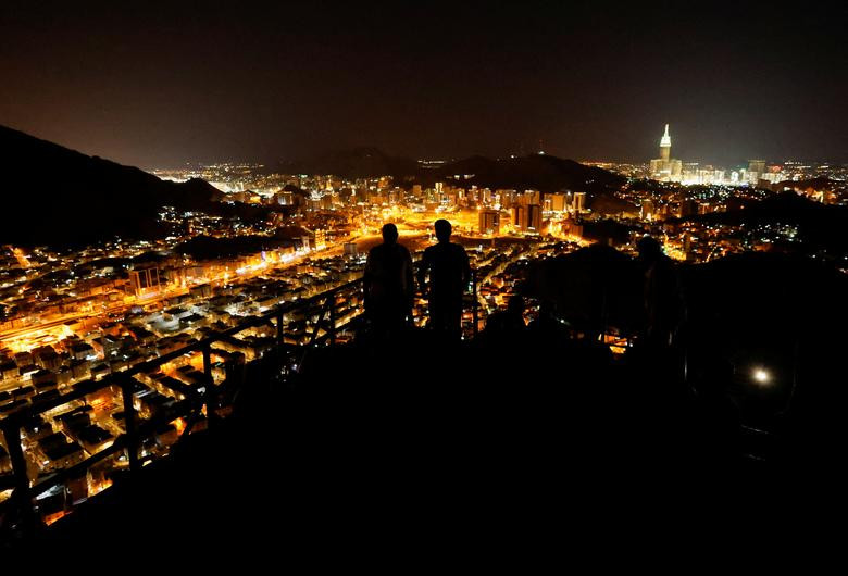 Muslim pilgrims visit Mount Al-Noor, where Muslims believe Prophet Mohammad received the first words of the Koran through Gabriel in the Hira cave, in the holy city of Mecca, Saudi Arabia, July 4, 2022.  REUTERS