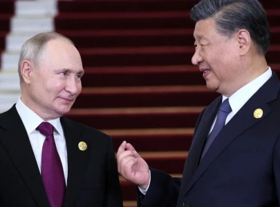 putin praises dear friend xi pitches russia s northern sea route