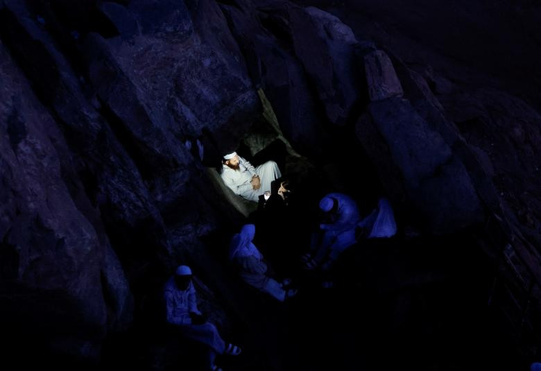 A Muslim pilgrim visits Mount Al-Noor, where Muslims believe Prophet Mohammad received the first words of the Koran through Gabriel in the Hira cave, in the holy city of Mecca, Saudi Arabia, July 4, 2022.  REUTERS