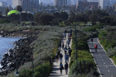 australia s covid 19 hotspot on track for easing curbs faces three lawsuits