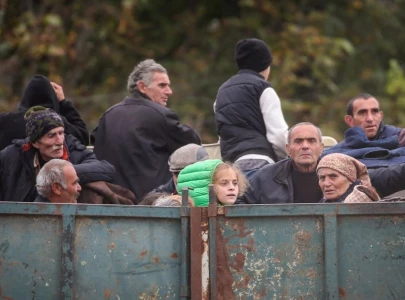tens of thousands of ethnic armenians rush to flee nagorno karabakh