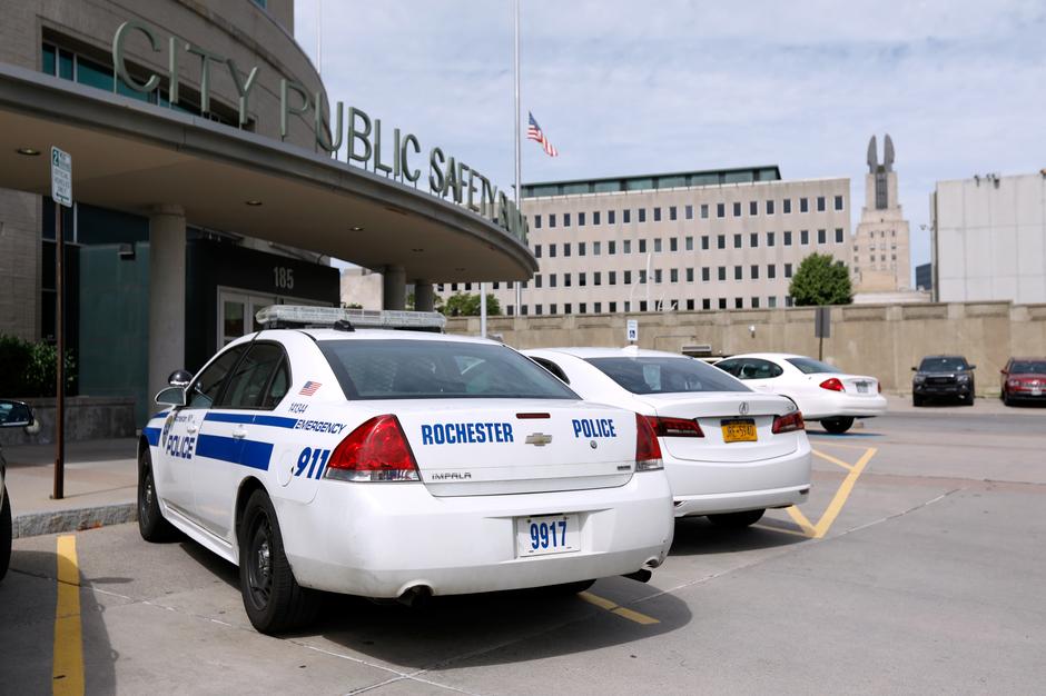 a view of police cars parked outside city public safety building following the death of a black man daniel prude after police put a spit hood over his head during an arrest on march 23 in rochester new york u s september 3 2020 reuters