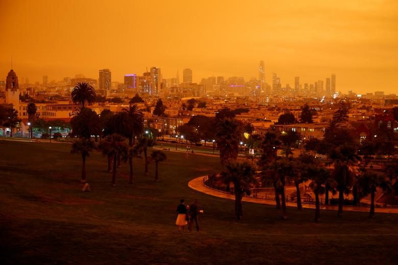 downtown san francisco is seen from dolores park under an orange sky darkened by smoke from california wildfires in san francisco california september 9 reuters