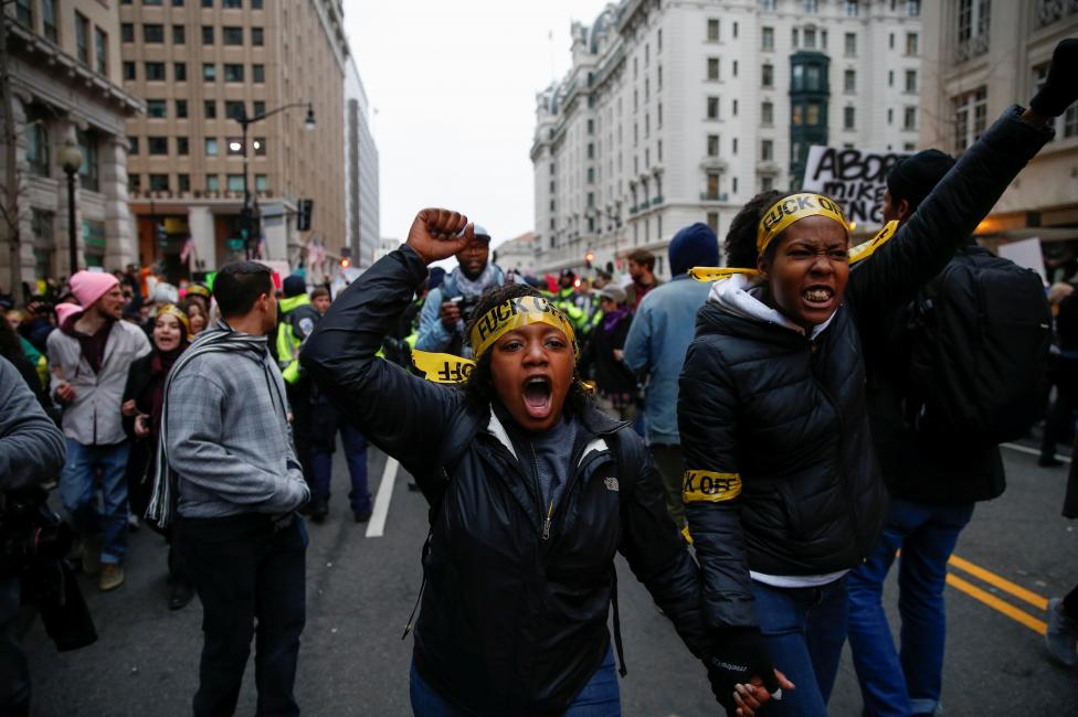 Activists taking part in the Women's March shout slogans as they rally through Washington. REUTERS/Adrees Latif