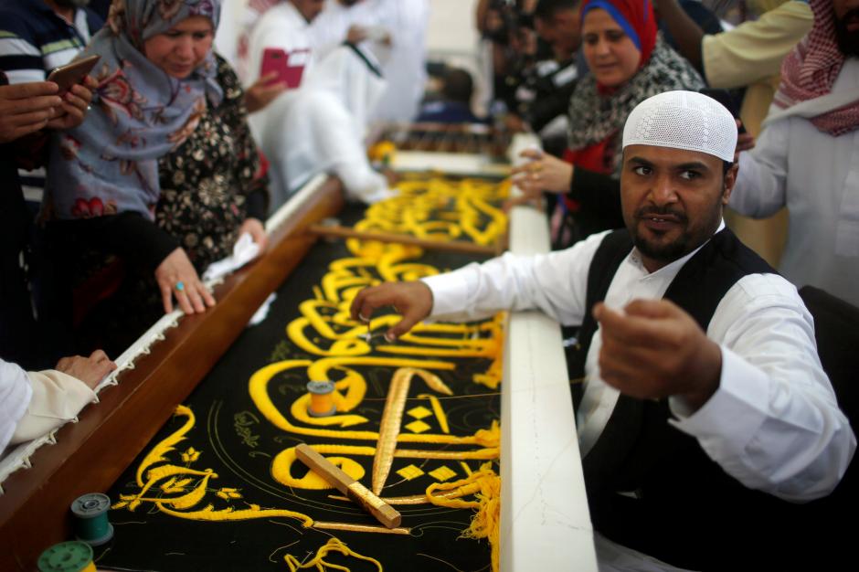 A man embroiders the Kiswa, a silk cloth covering the Holy Kaaba, ahead of the annual haj pilgrimage, at a factory in the holy city of Mecca, Saudi Arabia August 26, 2017. REUTERS/Suhaib Salem