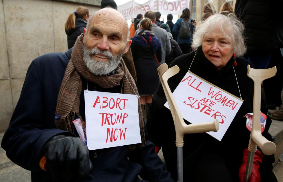 Protesters take part in the Women's March in Paris. REUTERS/Jacky Naegelen