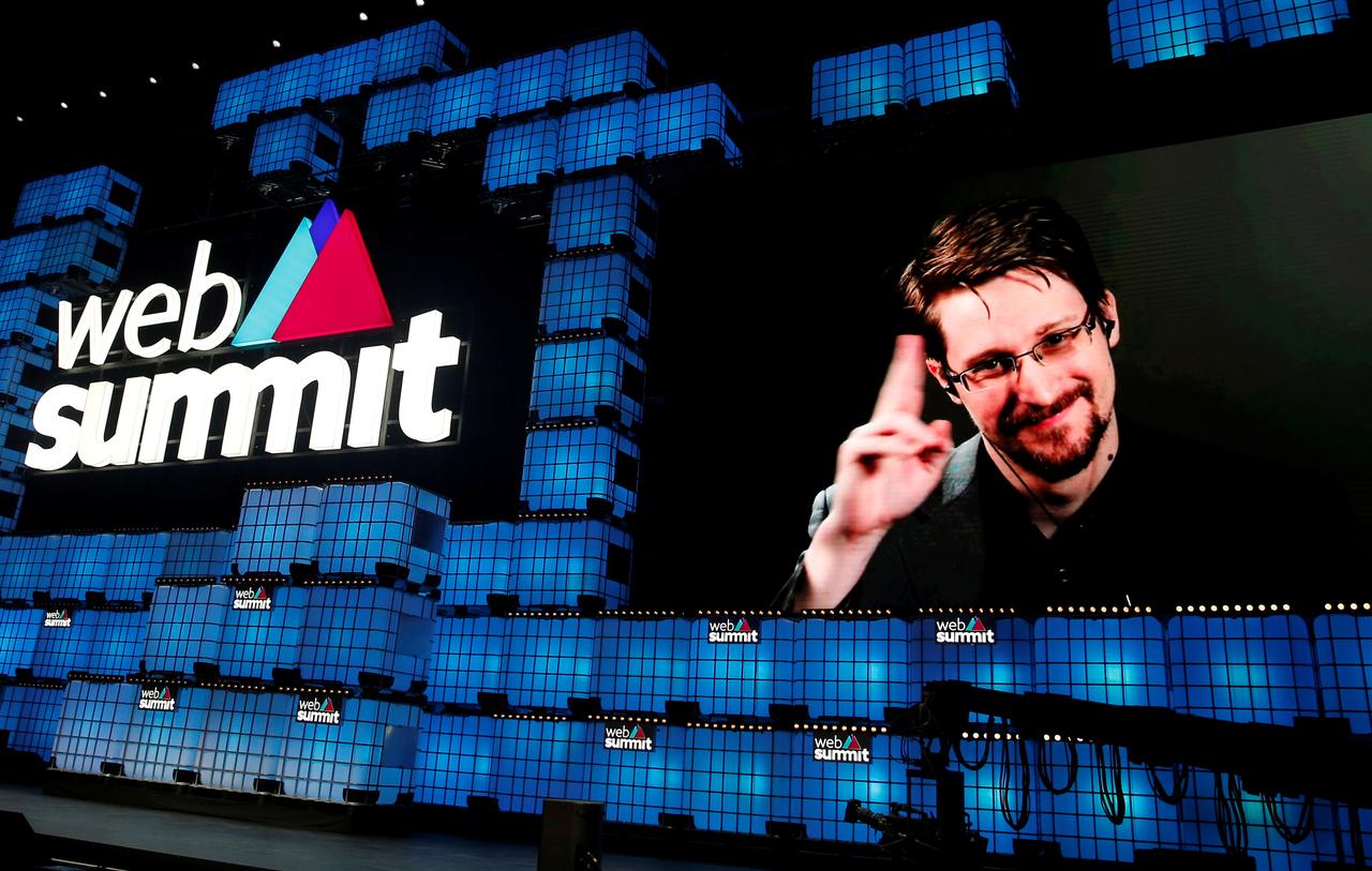 edward snowden gestures as he speaks via livestream at web summit in lisbon portugal reuters