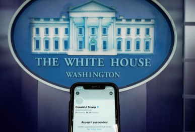 a photo illustration shows the suspended twitter account of u s president donald trump on a smartphone at the white house briefing room in washington u s january 8 2021 reuters