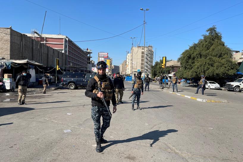 iraqi security forces keep guard the site of a suicide attack in baghdad iraq january 21 2021 reuters