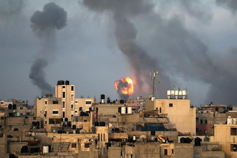 flames and smoke rise during israeli air strikes amid a flare up of israel palestinian violence in the southern gaza strip photo reuters