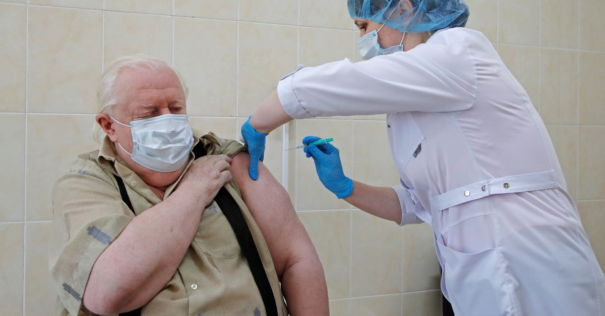 a man receives a dose of the epivaccorona vaccine against the coronavirus disease covid 19 developed by the vector institute in siberia at a local clinic in saint petersburg russia april 12 2021 photo reuters