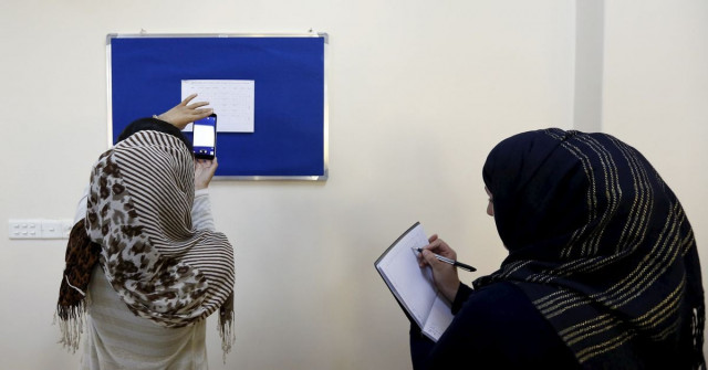 female students join male peers as afghan universities reopen female students join male peers as afghan universities reopen