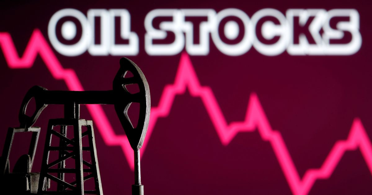 a 3d printed oil pump jack is seen in front of displayed stock graph and oil stocks words in this illustration picture april 14 2020 reuters