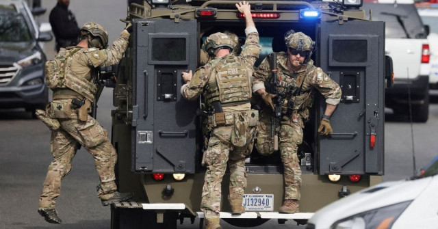 an fbi tactical team deploys from an armored vehicle at the scene of a reported shooting and active shooter near edmund burke middle school in the cleveland park neighborhood of northwest washington u s april 22 2022 reuters an fbi tactical team deploys from an armored vehicle at the scene of a reported shooting and active shooter near edmund burke middle school in the cleveland park neighborhood of northwest washington u s april 22 2022 reuters