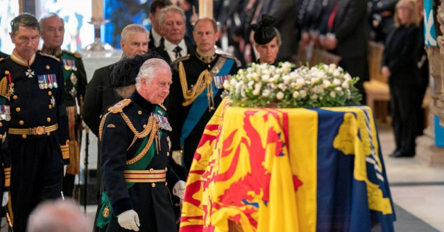 the cortege makes its way on the mall in a nighttime rehearsal for when the coffin will be moved from buckingham palace to westminster hall where britain s queen elizabeth will lie in state for four days following her death in london britain september 13 2022 reuters