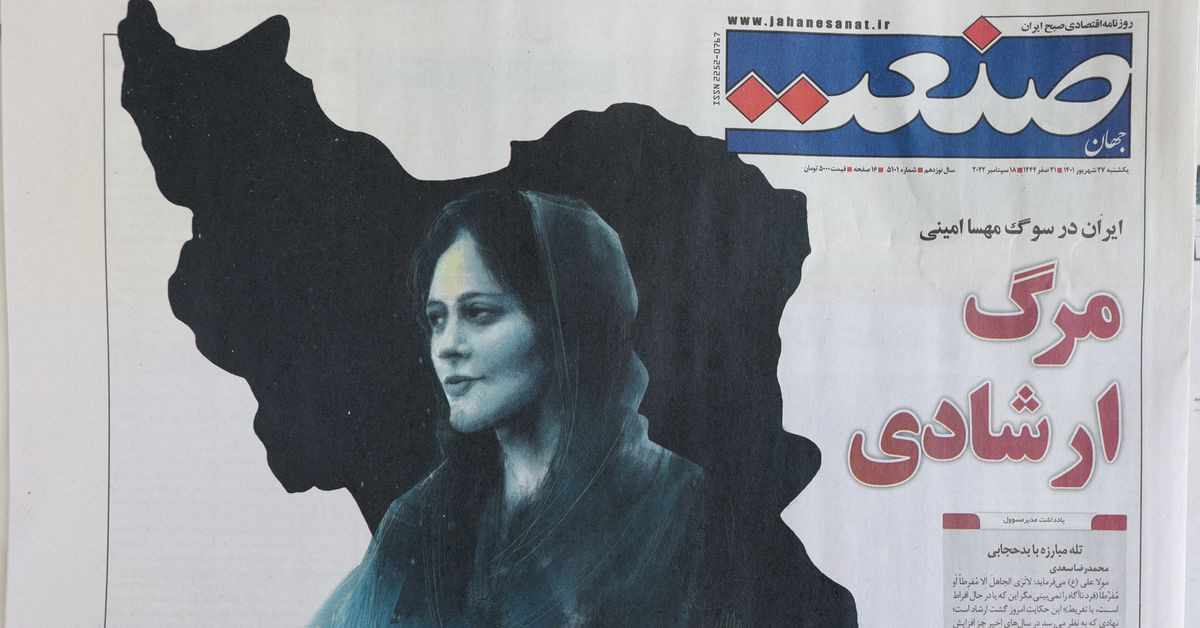 A newspaper with a cover picture of Mahsa Amini, a woman who died after being arrested by the Islamic republic's 