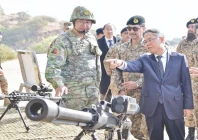 chinese ambassador jiang zaidong inspects ammunition during his visit to the joint drill at pabbi photo nni