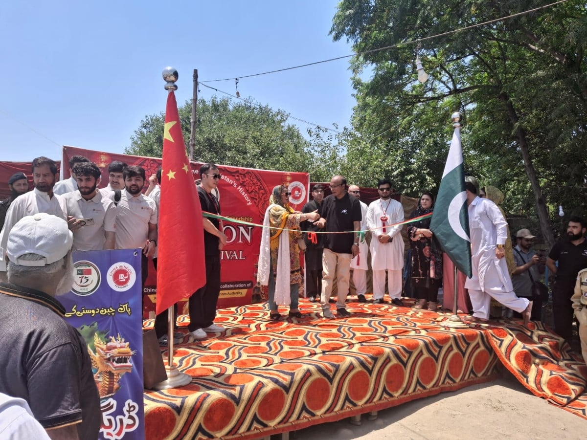 K-P police, Charsadda team scoops the winning trophy. PHOTO: EXPRESS