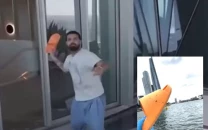 drake s orange slipper allegedly found after he threw it at drone from his penthouse balcony