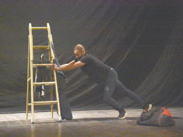 artists perform during palestinian theatre production as if it were a dream at the arts council of pakistan karachi photo express artists perform during palestinian theatre production as if it were a dream at the arts council of pakistan karachi photo express