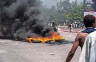 burning tires block a road during a demonstration against the escalating conflict in eastern democratic republic of congo in kinshasa on january 28 2025 photo afp