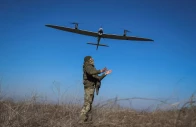 a ukrainian serviceman launches a mid range reconnaissance drone type vector for flying over positions of russian troops amid russia s attack on ukraine near the town of bakhmut in donetsk region ukraine march 12 2024 reuters