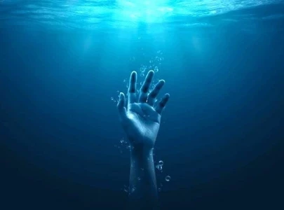 man jumps into sea with two children man jumps into sea with two children