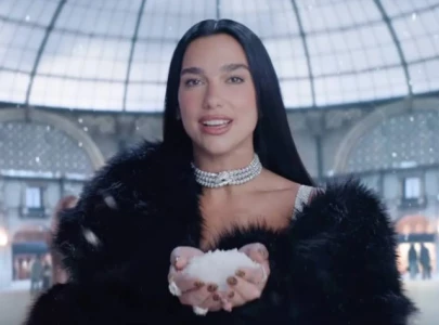dua lipa s icy new twist surprises fans in 2026 winter olympics ad