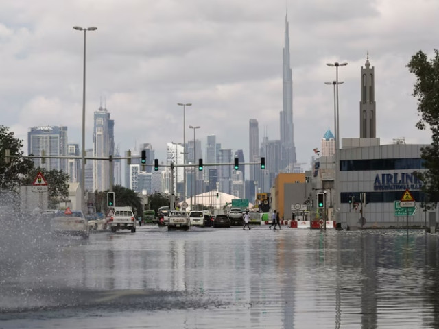 a general view of flood water caused by heavy rains with the burj khalifa tower visible in the background in dubai united arab emirates april 17 2024 photo reuters