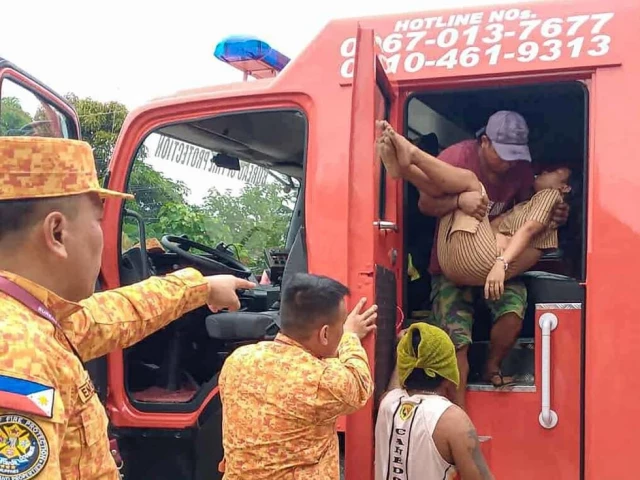 bureau of fire protection evacuating a resident in baganga town davao oriental province in southern island of minadanao after a 7 4 magnitude struck the province in southern philippines photo afp bureau of fire protection evacuating a resident in baganga town davao oriental province in southern island of minadanao after a 7 4 magnitude struck the province in southern philippines photo afp
