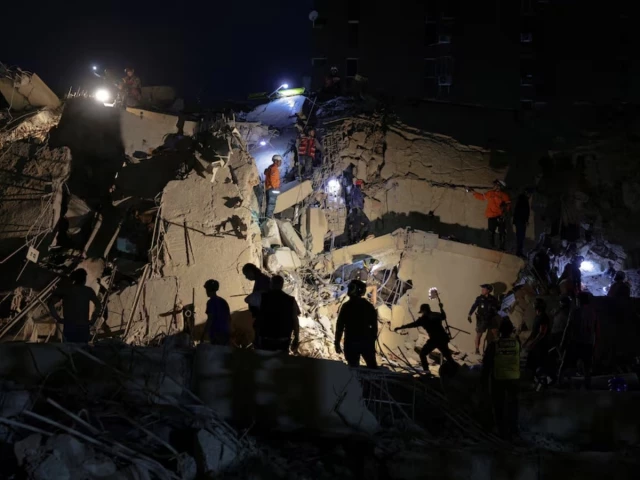 emergency services work at the site of a collapsed building after an earthquake in caracas venezuela june 24 photo reuters emergency services work at the site of a collapsed building after an earthquake in caracas venezuela june 24 photo reuters