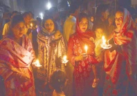 hyderabad s christian community gathers for a candlelight rally at dawn on easter spreading a message of love peace and hope photo inp