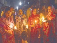 hyderabad s christian community gathers for a candlelight rally at dawn on easter spreading a message of love peace and hope photo inp