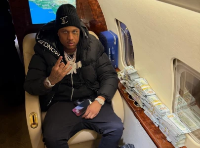ebk jaaybo flaunts cash bundles on private jet after release from prison ebk jaaybo flaunts cash bundles on private jet after release from prison