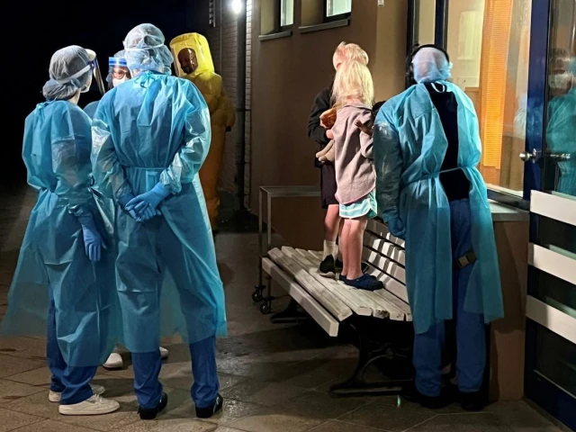two children of an american ebola patient look through a window at their father in the isolation ward at the charite hospital in berlin germany may 21 2026 charite handout via reuters two children of an american ebola patient look through a window at their father in the isolation ward at the charite hospital in berlin germany may 21 2026 charite handout via reuters