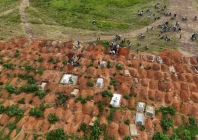 a drone view of displaced people from the kigonze camp attending the burial of ebola victims at nyamurongo cemetery one month after an outbreak was declared in bunia eastern democratic republic of congo june 18 2026 reuters