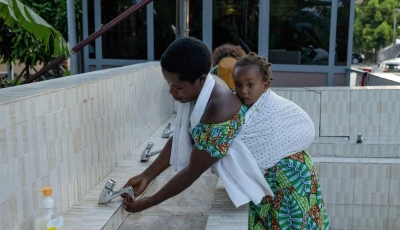 a woman washes her hands at the grande barrier border following confirmation of an ebola outbreak involving the bundibugyo strain at the border crossing point between congo and rwanda in goma democratic republic of congo may 18 2026 photo reuters
