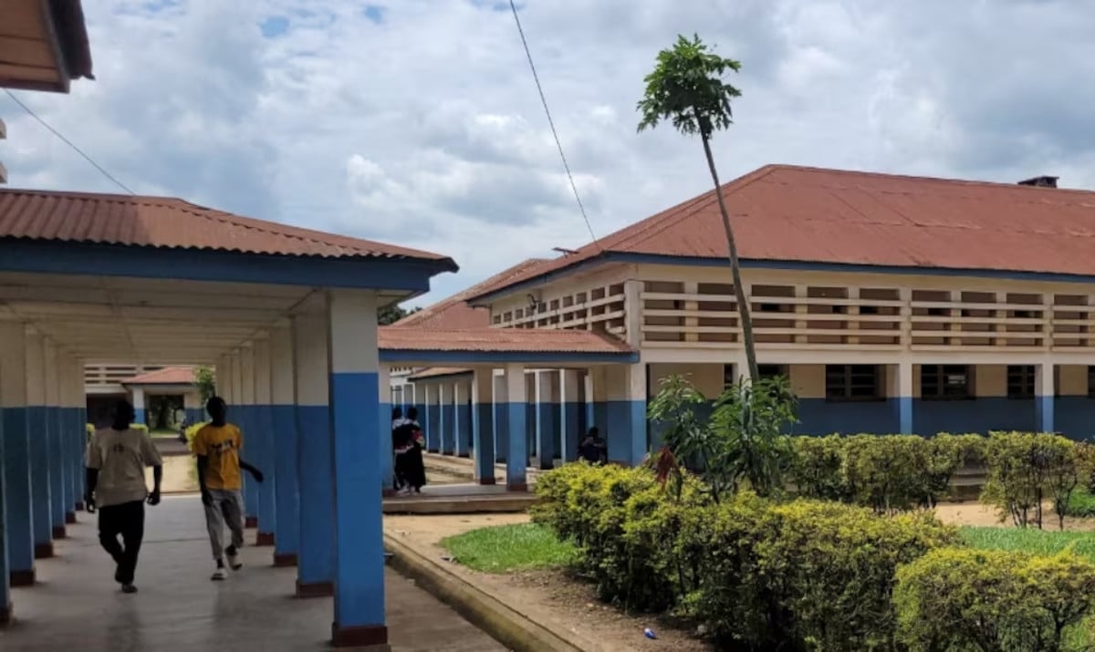 People walk at Bunia General Referral Hospital following confirmation of an Ebola outbreak involving the Bundibugyo strain in Bunia, Ituri province, Democratic Republic of Congo, May 16, 2026. Picture taken with a mobile phone. REUTERS