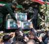 a picture of the late iranian president ebrahim raisi is seen on his coffin during a funeral ceremony held in tabriz east azerbaijan province iran may 21 photo reuters