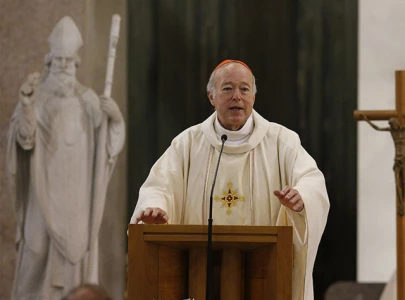 pope francis names trump critic as archbishop of washington