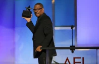 eddie murphy gestures on the stage after winning at the 51st afi life achievement award tribute gala at the dolby theatre in los angeles california u s april 18 2026 reuters daniel cole