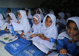 afghan refugee girls studying at the primary school khazana village pakistan photo unhcr
