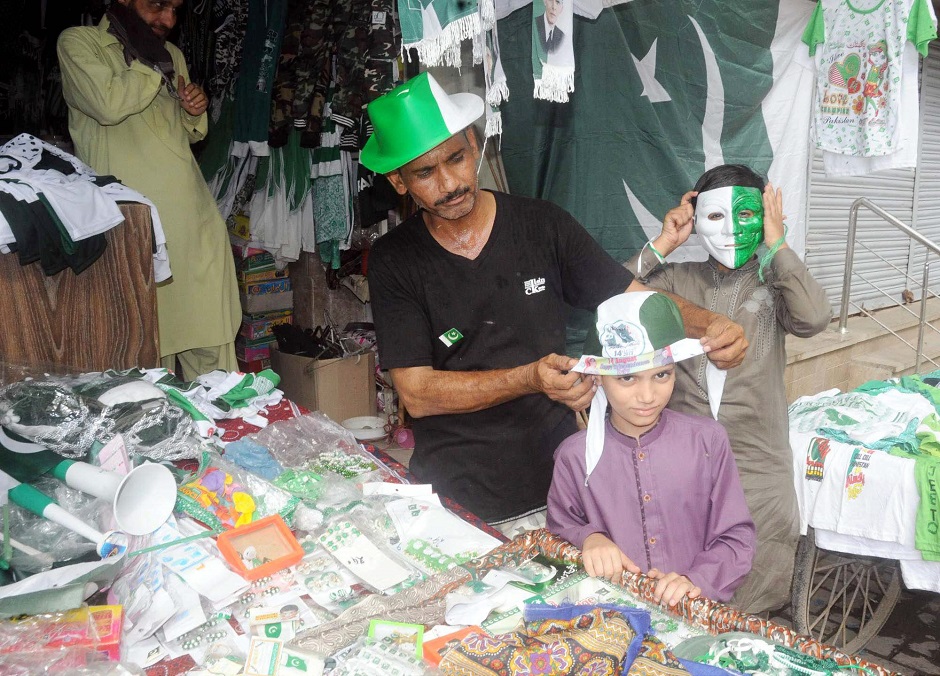 People gear up for Independence Day in Hyderabad, also the third day of Eidul Azha. PHOTO: APP