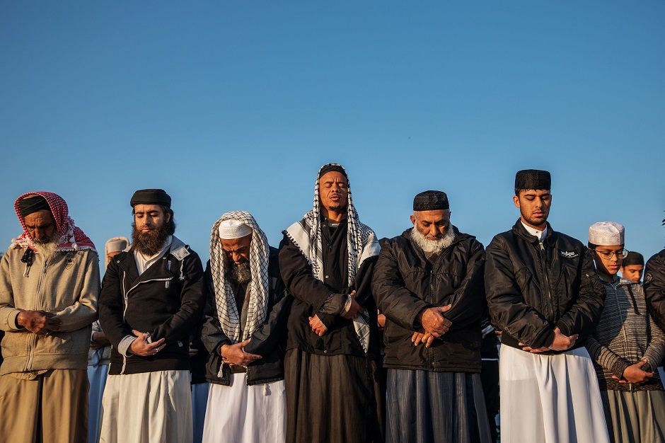 South African Muslims gather to offer Eidul Azha prayers in an open field in Lenasia, 30km south of Johannesburg. PHOTO: AFP