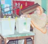 electoral moment a woman casts her vote in by election in faisalabad photo online