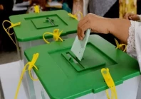 a woman casts vote during an election in pakistan photo express file