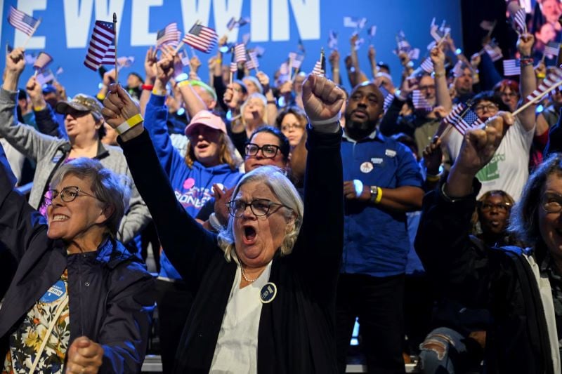 people attend a rally for tim walz the day before election day in west ellis wisconsin november 4 photo reuters