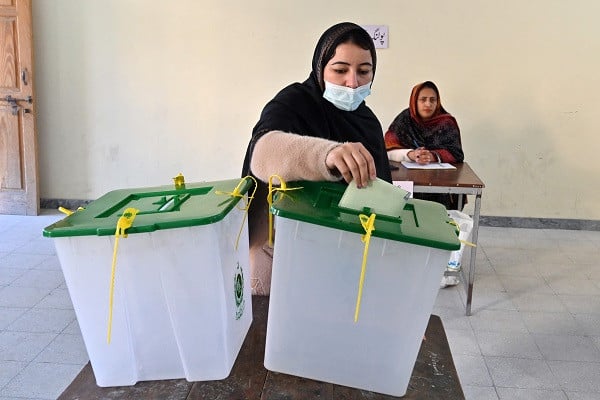 a woman cast her ballot at a polling station in islamabad on february 8 2024 photo afp