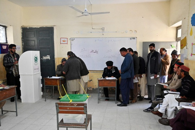 voters line up to cast their ballot at a polling station in islamabad on february 8 2024 photo afp voters line up to cast their ballot at a polling station in islamabad on february 8 2024 photo afp