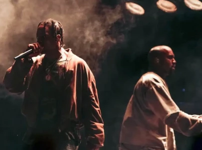 travis scott brings out kanye west during tokyo concert performance
